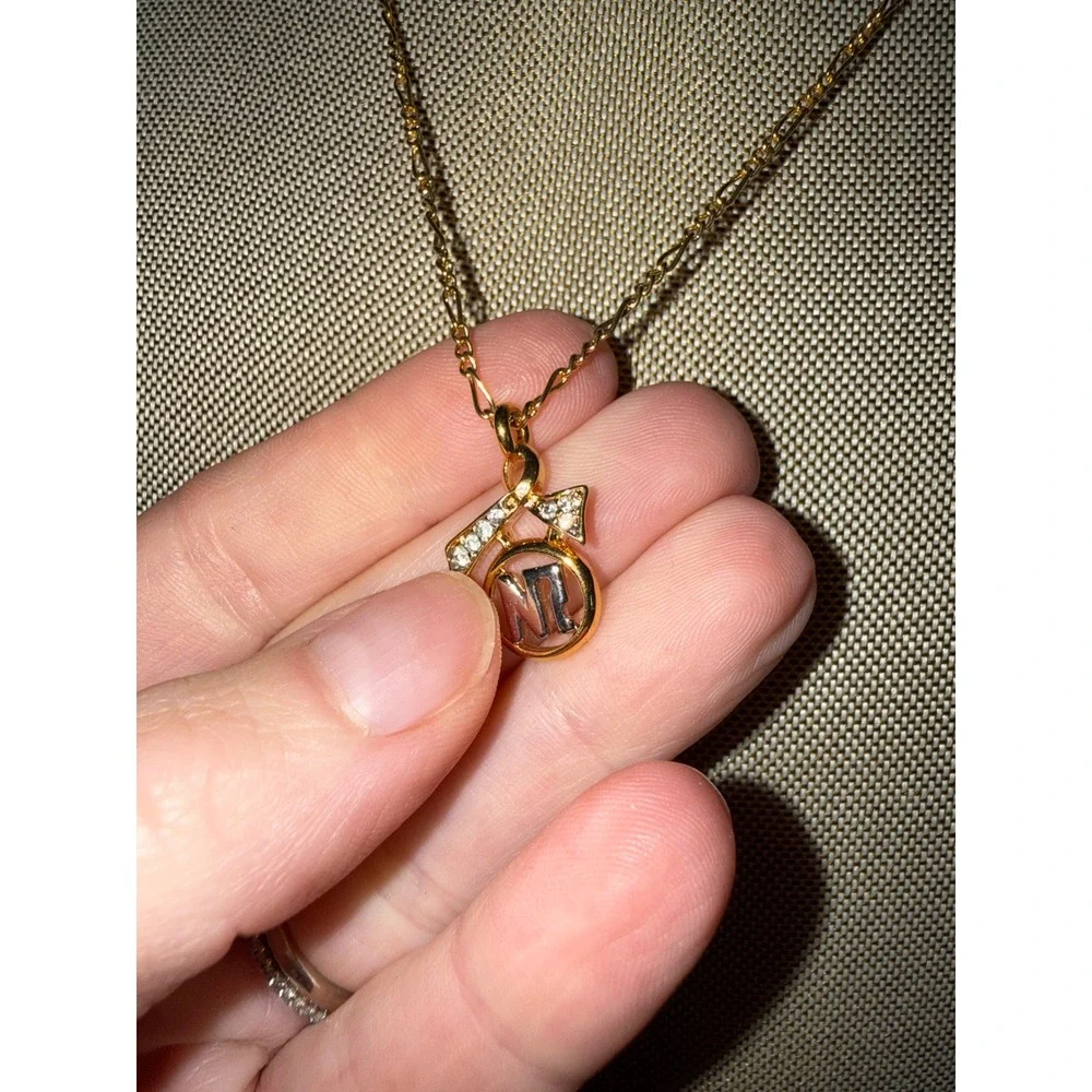 Nina Ricci Gold Tone NR Logo Bow Rhinestone Figaro Chain Necklace Vintage Style